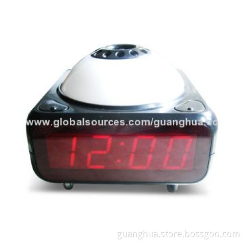 Alarm clock with perfume or mosquito repellent liquid heater function